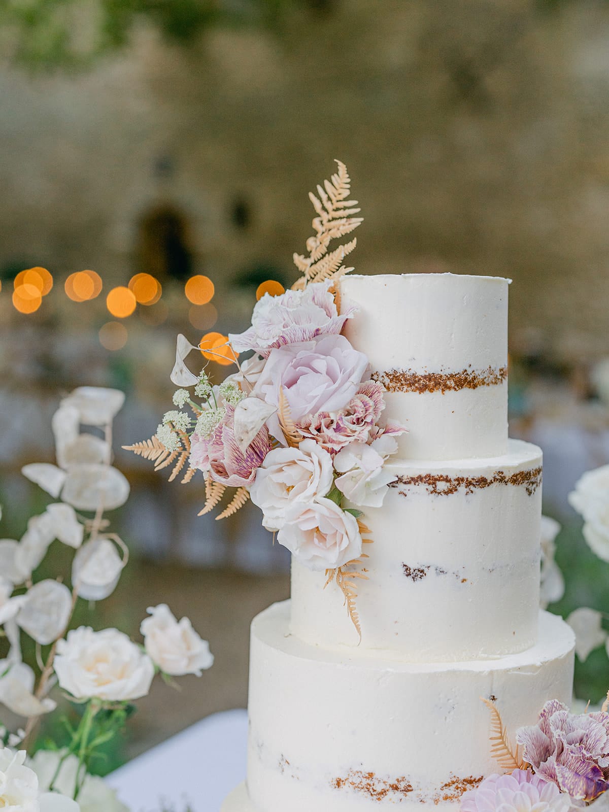 Evening reception table setting with florals