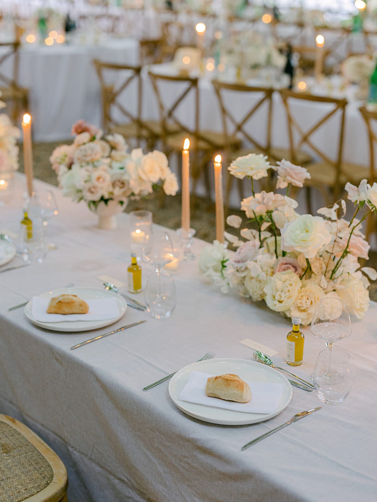 Evening reception table setting with florals